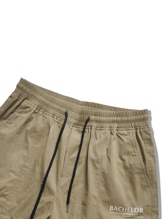 Manfinity Men Letter Graphic Flap Pocket Drawstring Waist Cargo Pants