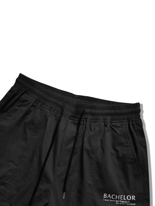 Manfinity Men Letter Graphic Flap Pocket Drawstring Waist Cargo Pants