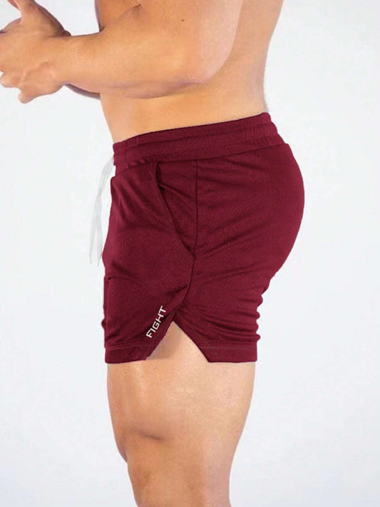 Manfinity Sport Streetwear Boyfriend Style Men Letter Graphic Drawstring Waist Split Hem Sports Stretchy Shorts Gym Shorts