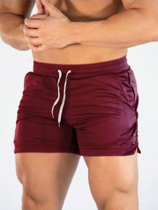 Manfinity Sport Streetwear Boyfriend Style Men Letter Graphic Drawstring Waist Split Hem Sports Stretchy Shorts Gym Shorts