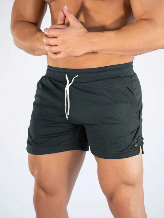 Manfinity Sport Streetwear Boyfriend Style Men Letter Graphic Drawstring Waist Split Hem Sports Stretchy Shorts Gym Shorts