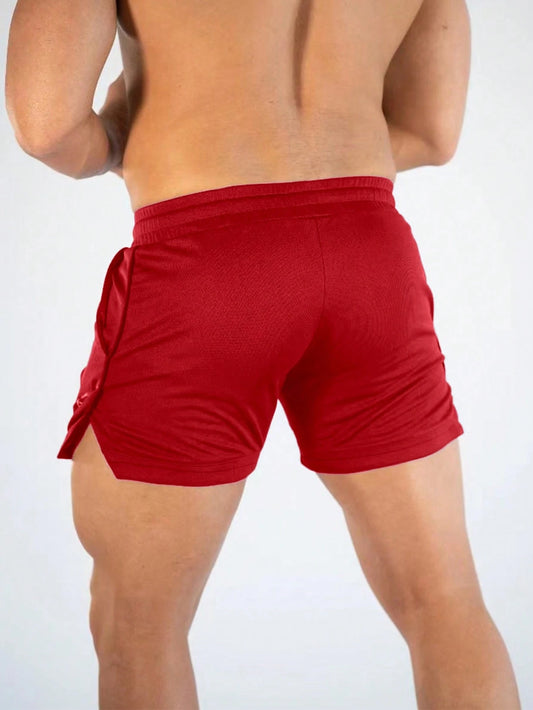 Manfinity Sport Streetwear Boyfriend Style Men Letter Graphic Drawstring Waist Split Hem Sports Stretchy Shorts Gym Shorts