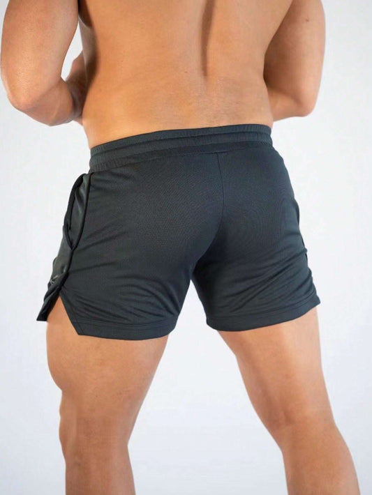 Manfinity Sport Streetwear Boyfriend Style Men Letter Graphic Drawstring Waist Split Hem Sports Stretchy Shorts Gym Shorts