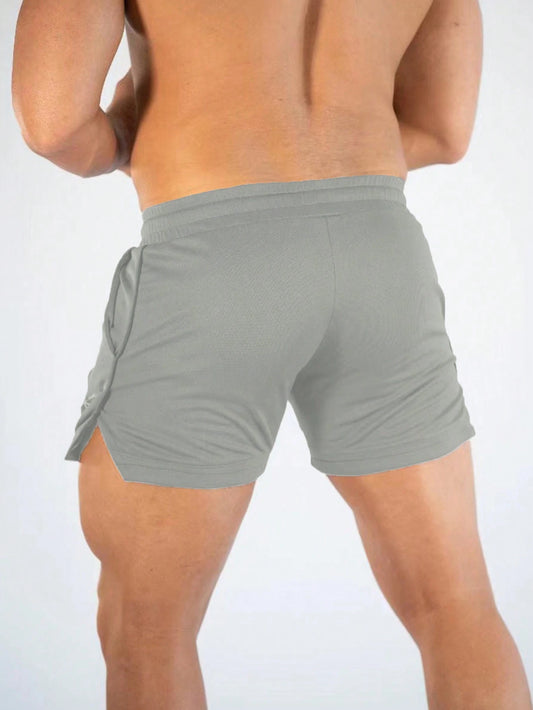 Manfinity Sport Streetwear Boyfriend Style Men Letter Graphic Drawstring Waist Split Hem Sports Stretchy Shorts Gym Shorts