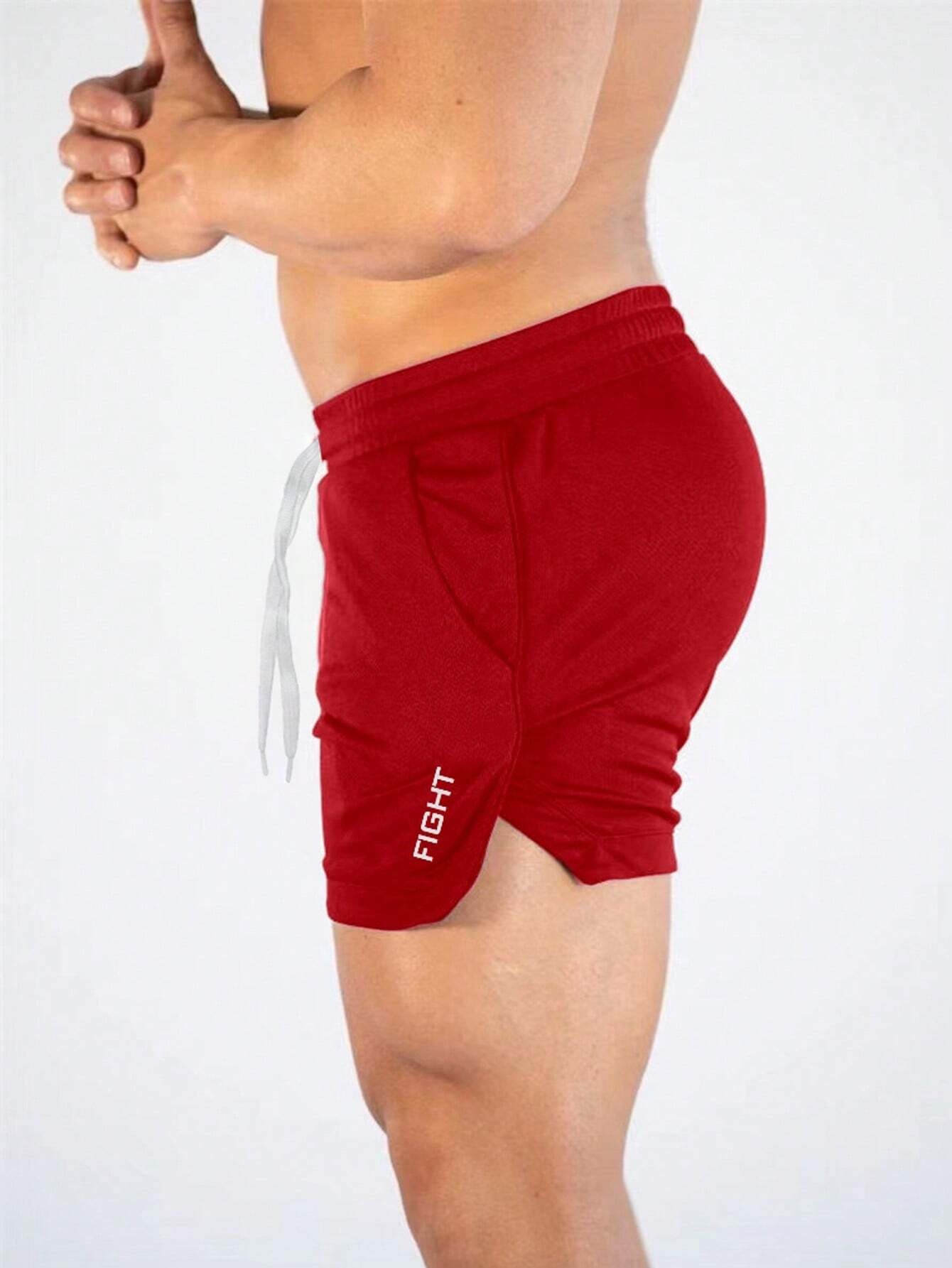 Manfinity Sport Streetwear Boyfriend Style Men Letter Graphic Drawstring Waist Split Hem Sports Stretchy Shorts Gym Shorts