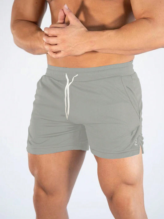 Manfinity Sport Streetwear Boyfriend Style Men Letter Graphic Drawstring Waist Split Hem Sports Stretchy Shorts Gym Shorts